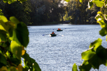 Russia, Pushkin-August 21, 2020: Photo of a boat with people swimming on the river