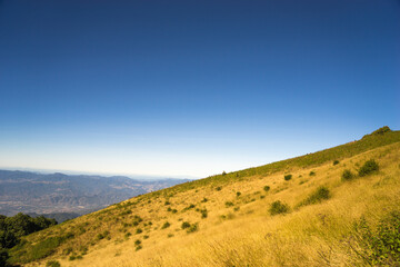 Mountain landscape with blue sky.
