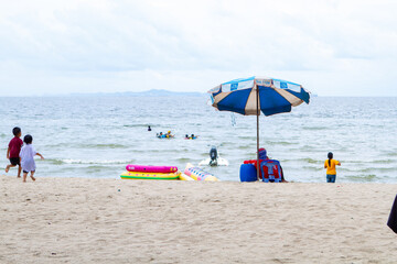 Fototapeta na wymiar beach scene with umbrella