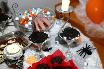 Halloween desserts and decor. Selective focus.