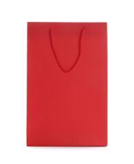 Red paper shopping bag isolated on white