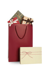 Paper shopping bag and gift boxes isolated on white