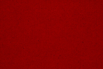 Red textured cardstock paper closeup background