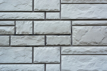 texture of mosaic brickwork of different sizes and shapes