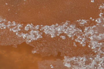Close up of salt evaporation pools with lye