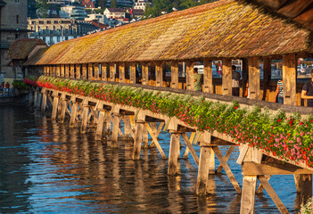 old ancient wooden bridge in Lucerne over the Reuss river