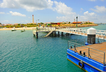 Fototapeta na wymiar Arrival by ferry boat to Culatra island, Ria Formosa Olhao, Algarve, southern Portugal