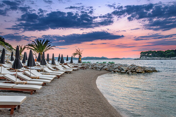 Sunset over sandy beach