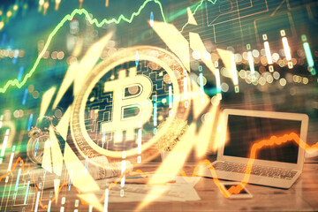 Double exposure of blockchain theme hologram and table with computer background. Concept of bitcoin crypto currency.