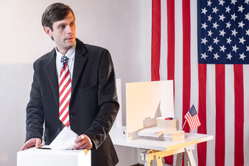 Voter from United States America during elections. Man votes in US presidential elections. Human in...