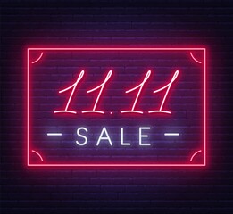 11.11 Singles day sale neon sign on a dark background .