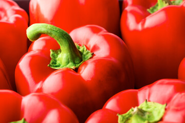Red bell peppers background. Top view