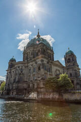Fototapeta na wymiar Giant Berlin cathedral under a blue sky by the sea
