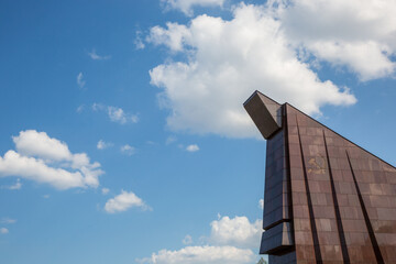 Soviet War Memorial in Berlin with a background of clouds and blue sky