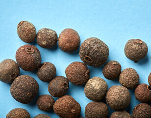 whole allspice isolated on white background. Aromatic allspice. Spice. Seasoning.