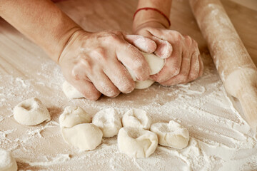 hands kneading dough, baker, the Baker's hands, dough, hands in the flour, dumplings, handmade...