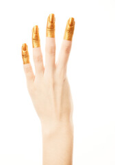 Hands in gold paint. Golden fingers. Female hand is showing numbers isolated on white background. Sign language. Hand numbers