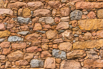 wallpaper mur de pierres rouges de Piana