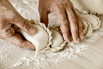 hands kneading dough, baker, the Baker's hands, dough, hands in the flour, dumplings, handmade dumplings, ravioli