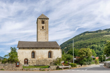 Fototapeta premium The ancient Church of San Benedetto in the historic center of Malles Venosta, South Tyrol, Italy