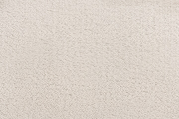 Fototapeta premium White natural wool with white texture background. white seamless woolen plaid. texture of fluffy fur for designers, close-up fragment white wool carpet