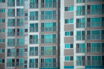 the facade of an apartment of the same shape and pattern.