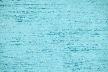 natural plywood background painted blue solid color with brush strokes, new and clean