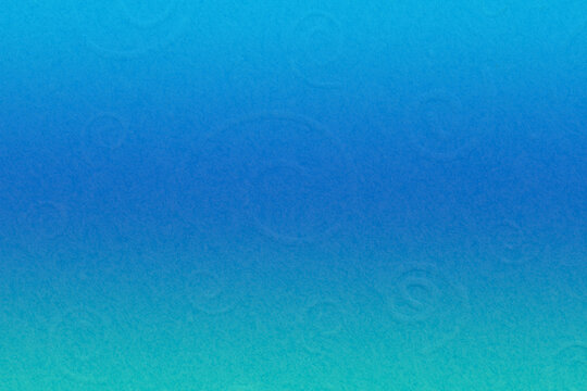 Blue textured cardstock paper with swirls closeup background