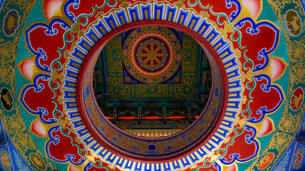 Colours of traditional Chinese arts and architecture. Chinese roof top and blue sky