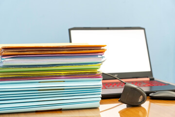 Using scanner machine for convert document to digital data storing into computer, Stacks of paper, piles of unfinished documents, Business report papers.