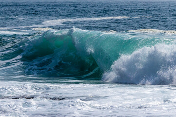 Naklejka premium ..Beautiful large storm waves off the coast of Cape Tobizin on the Russian island in Vladivostok.