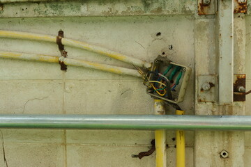 Exposed electrical junction box on the wall