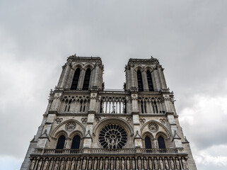Notre Dame Cathedral facade with medieval ornaments erected high