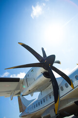 Jet airplane with propeller engine on the ground