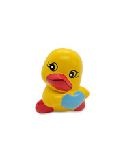 Cute yellow duck figurine isolated on white background.