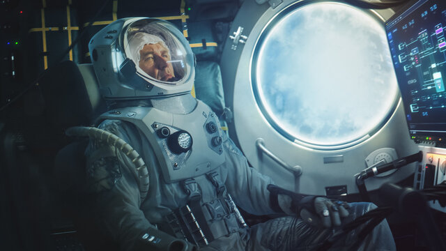 Astronaut Sitting Inside a Space Rocket During Take Off. Successful Rocket Launch Sending Space Ship into Space. Cosmonaut Experiencing G-Force and Vibrations Inside Capsule. Clouds in Porthole.