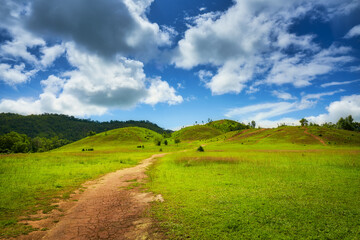 Ranong green hill valley in clear blue sky daytime