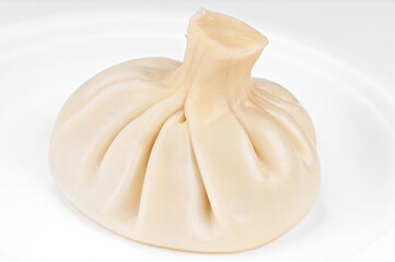 Traditional Georgian dumplings khinkali stuffed with ground beef meat and spices