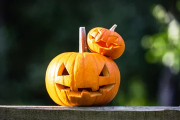 Foto op Plexiglas Halloween pumpkins or jack-o-lantern at home terrace. Decoration and holidays concept © Ivan Kmit