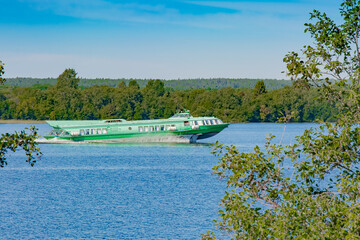 Hydrofoil meteor or comet on Lake Onega. The ship moves on the surface of the lake in a cloud of...