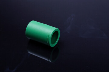  Plastic T-tube fittings on Black background, PVC Pipe connections, PVC Pipe fitting, PVC Coupling
