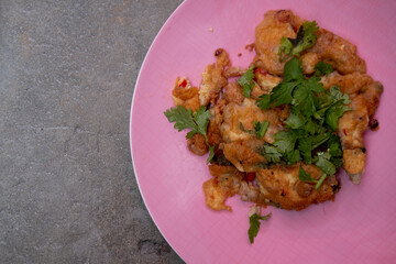 Homemade mixed vegetable omelette simple but delicious in pink plate.