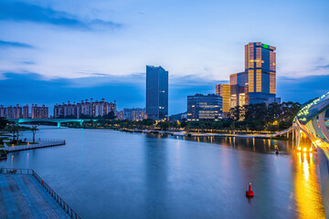 Obraz premium Night view of Jiaomen building skyline in Nansha District, Guangzhou, China