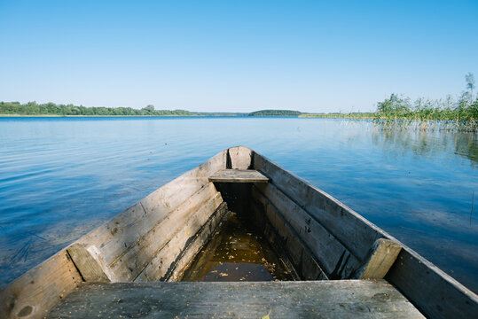 Old wooden boats on the Strusto lake. View of the third largest among the Braslav lakes. Braslav. Belarus