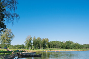 Old wooden boats on the Strusto lake. View of the third largest among the Braslav lakes. Braslav. Belarus