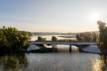 Fototapeta na wymiar Empty bridge in countryside in the morning