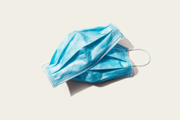 Blue surgical masks overhead view - flat lay