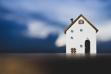 House model on wood table. Real estate agent offer house, property insurance and security, affordable housing concepts