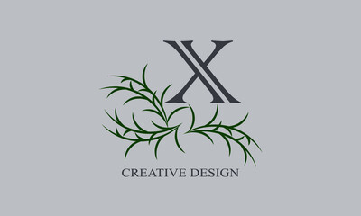 Decorative botanical logo with the letter X. Elegant floral monogram for weddings, invitations, labels, business.