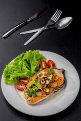 Spicy fried salmon salad